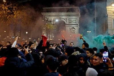 Football fans clash with police in Paris following World Cup quarter-finals