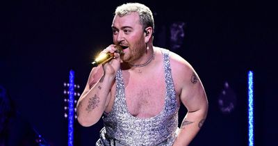 Sam Smith wows fans in low-cut sequinned body suit on stage at Jingle Bell Ball