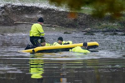 Solihull incident – latest: Boys ‘died trying to save friend who got stuck in ice’