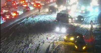 M25 traffic CHAOS: Drivers trapped in cars overnight as snow brings traffic to standstill