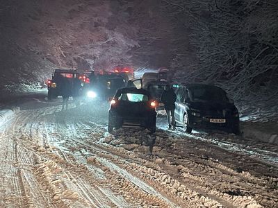 Weather – live: Snow and ice causes travel disruption across major roads and rail networks