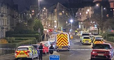 Armed police lock down Edinburgh street amid emergency incident