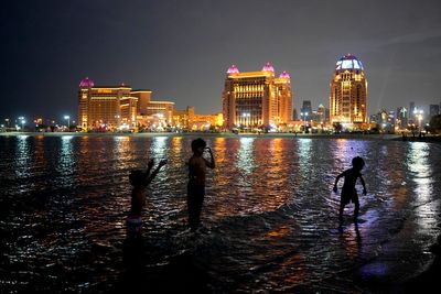 AP PHOTOS: Qatar bustles with life as World Cup nears end