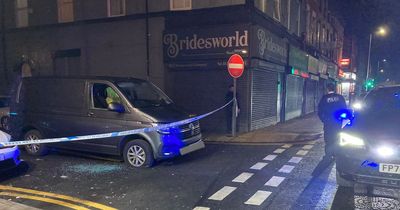 Police helicopter chase as van speeds through red lights and mounts pavement