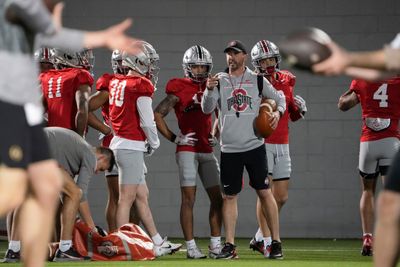 Ohio State wide receivers coach Brian Hartline receives an honor from On3