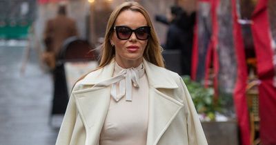 Amanda Holden braves the frosty weather as she steps out in figure-hugging outfit