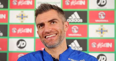 Aaron Hughes open to coaching role under Michael O'Neill if time permits