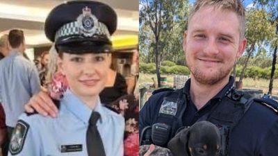 Two police officers shot dead during siege at Queensland property identified as Rachel McCrow and Matthew Arnold