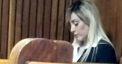 Irishwoman wanted here in connection with double murder led to court in chains