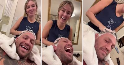 Conor McGregor fans left confused as UFC star has hair washed by fiancee