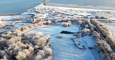 Snow and ice warnings extended across UK as temperatures continue to fall