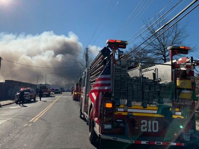 Firefighters battle blaze at NYPD evidence storage facility in Brooklyn