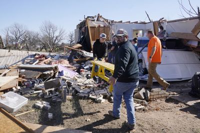 A massive storm brings tornadoes to the South and a blizzard threat to central U.S.