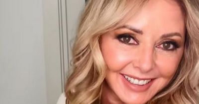 Carol Vorderman shimmies in 'old' dress as she shows off glam makeover