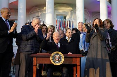 ‘Historic’: Biden signs law protecting LGBTQ marriage rights