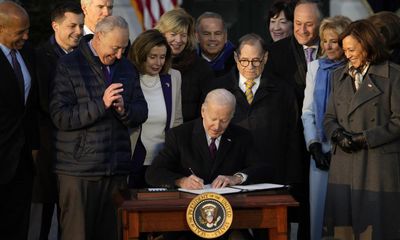 Biden signs landmark law protecting same-sex and interracial marriages