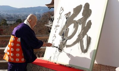 Japan chooses ‘war’ as kanji of the year amid Ukraine conflict and Abe assassination