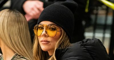 Khloe Kardashian shows off fuller lips as she glams up for morning workout