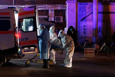 Medical staff in China's hospitals say COVID-19 ripping through their ranks