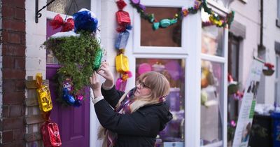 Inside 'real life Quality Street' with houses decorated with giant sweets to help foodbank