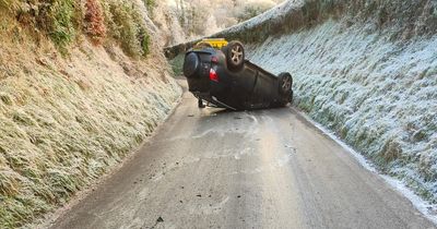 South Belfast crash sees car end up on its roof