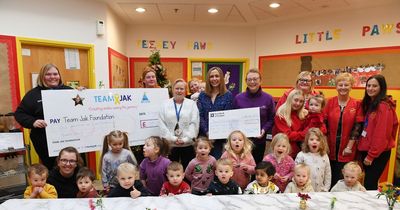 Christmas comes early as nursery kids hand over cheques to charity