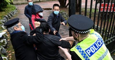 Six Chinese officials leave UK after protester beaten outside Manchester consulate