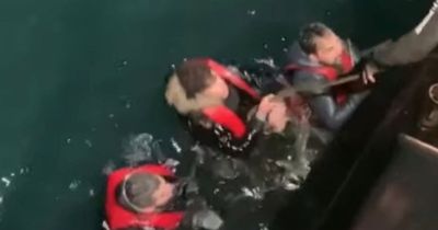 Hero fishermen pulled 31 screaming migrants to safety in scenes 'like World War 2 film'