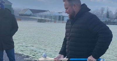 Shane Lowry shows off hurling skills in frosty conditions