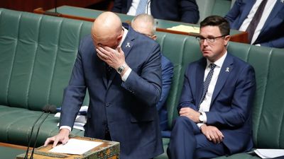 Peter Dutton becomes emotional during condolence motion for Queensland police officers killed in shooting