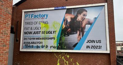 'It was just a joke': Gym owner defends controversial billboard after vandals attack