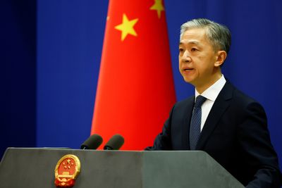 Beijing touts institutional advantages in fight against COVID