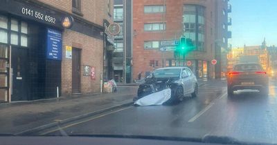 Glasgow road blocked by badly damaged car 24-hours after crash