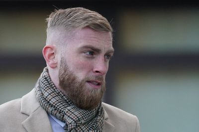 Assault charge footballer tells court he hopped over fan to protect injured foot