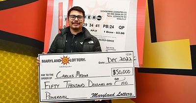 Man wins $50,000 after accidentally putting too much cash into lottery machine