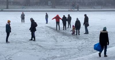 Glasgow council staff break ice around city ponds to stop public playing on frozen water