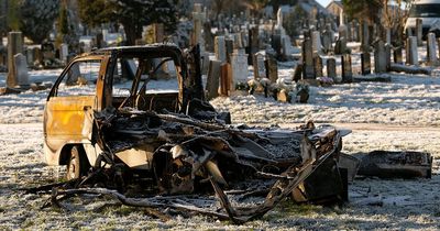 Burnt out shell of van in notorious Scots cemetery after being torched as probe launched