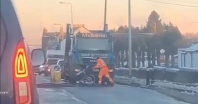 Midlothian lorry driver helps man in wheelchair cross road during icy conditions