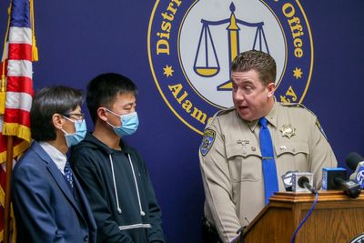 3 charged in toddler's slaying in California gang gun battle
