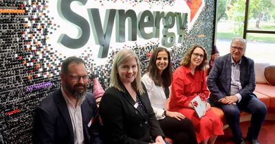 Synergy Group donates laptops to Canberra community groups