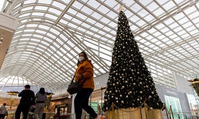 Australia’s latest Covid wave nears peak but cases to stay high through Christmas, experts say