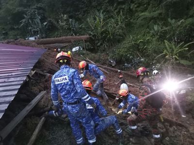 A landslide at a campground in Malaysia has killed at least 16 and left 17 missing