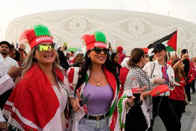 At World Cup, women fans shrug off worries over dress codes