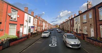 Woman injured after thugs hold terrified family at knife point