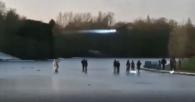 Worry and shock as ten people filmed sliding across frozen lake