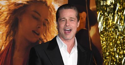 Brad Pitt claims unscripted Margot Robbie kiss is 'tamest thing' in their new film