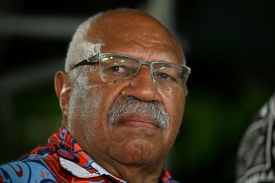 Fiji vote tightening as police question opposition leader