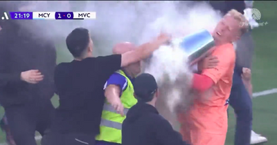 Goalkeeper struck by a BIN as disgusting Australian pitch invasion ends in chaos