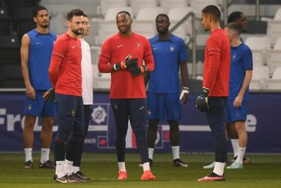 Entire France squad trains on eve of World Cup final despite virus