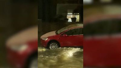 Burst watermain floods North London road